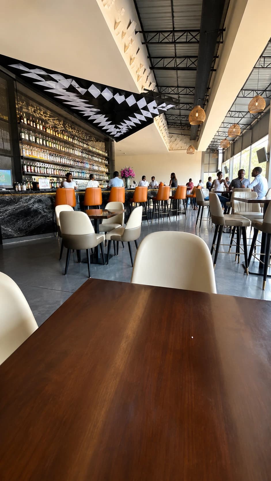 Modern GreenLeaf Kitchen and Bar cafe lounge with warm seating